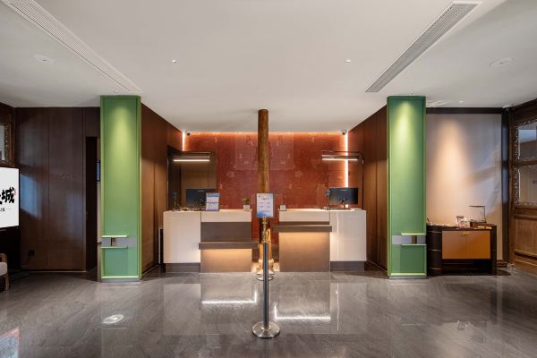 Lobby space with traditional design elements and seating.