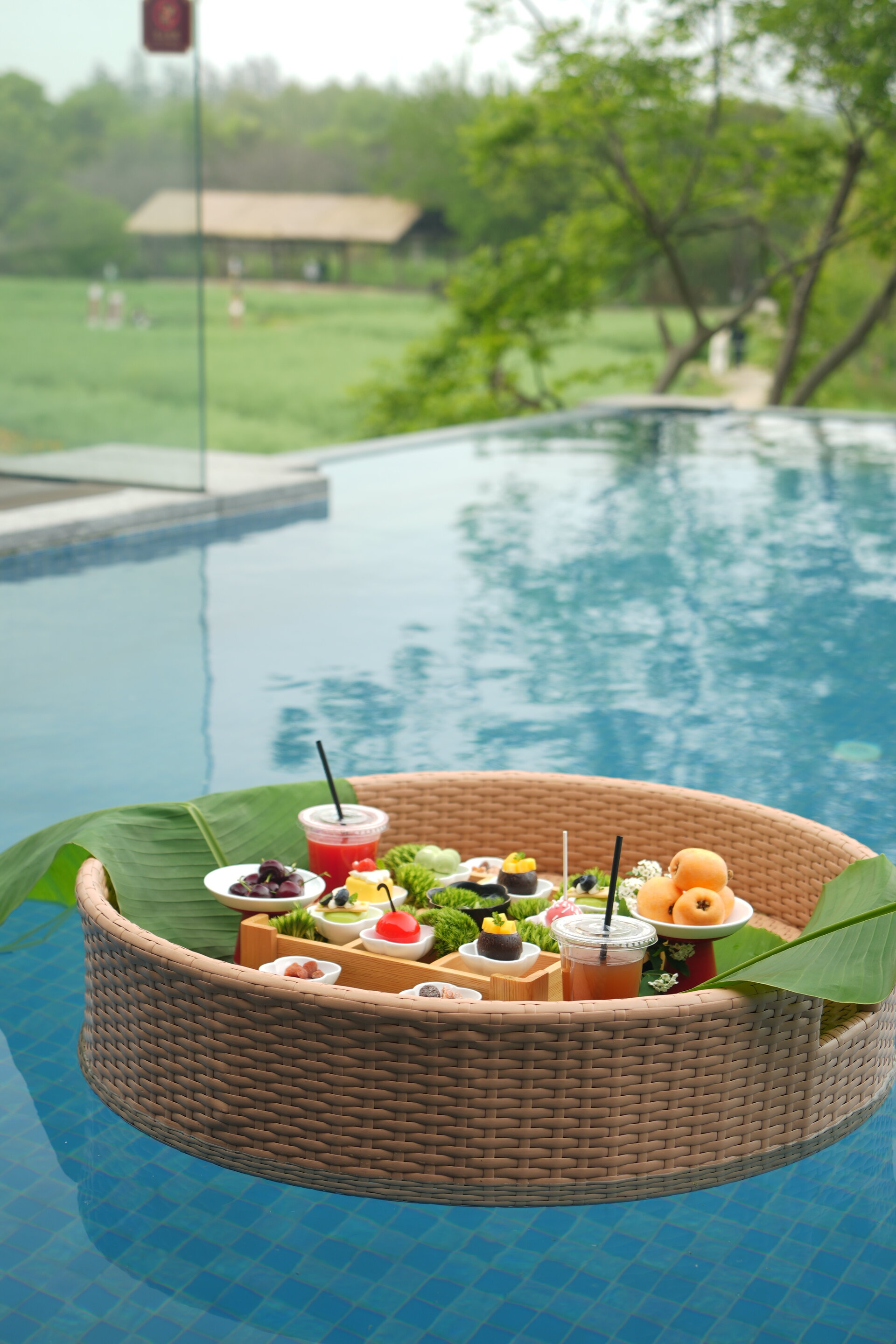 A selection of delicate afternoon tea desserts presented on a tiered stand.