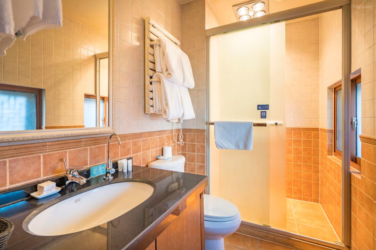 Guestroom with modern amenities and clean, minimalist design.