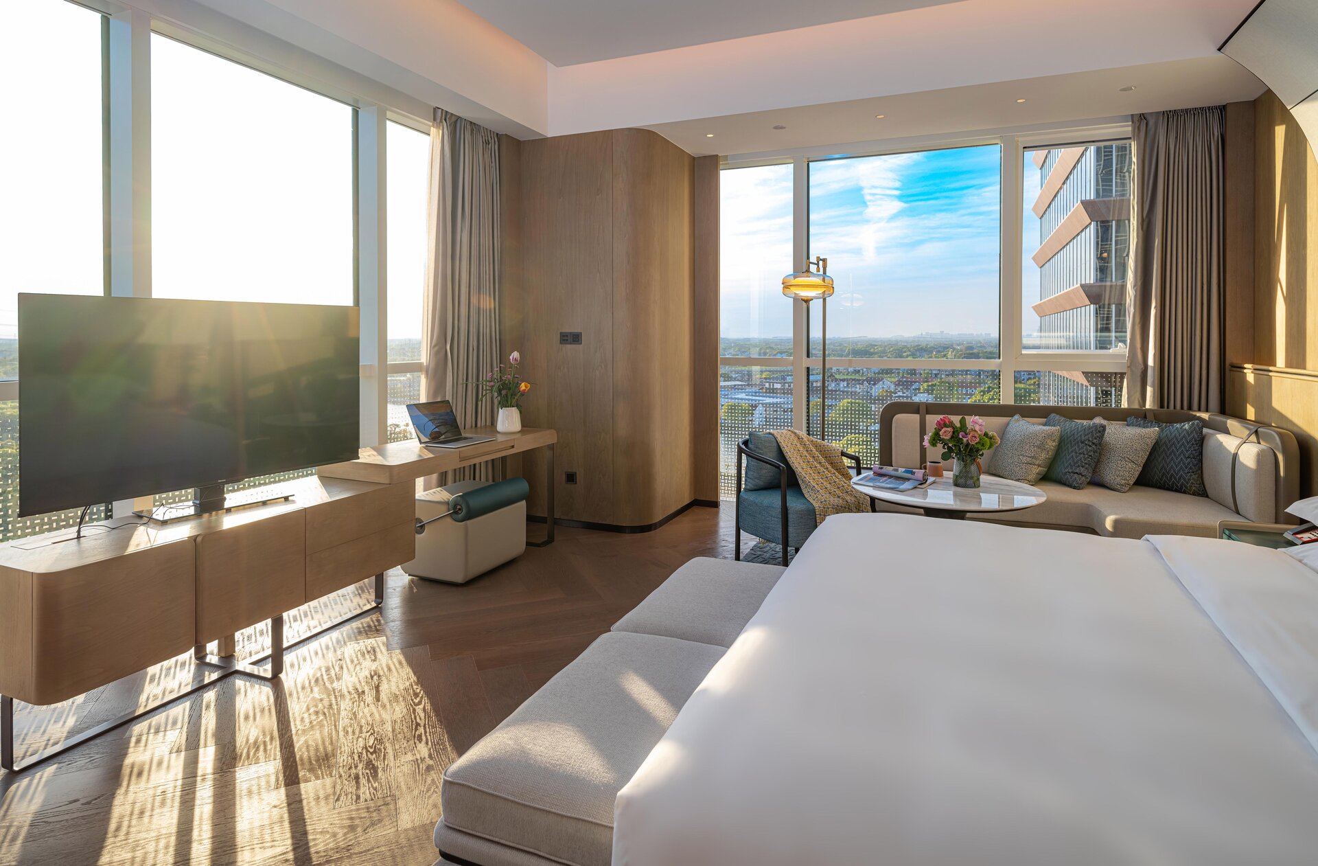 Interior of a deluxe double room with modern decor.