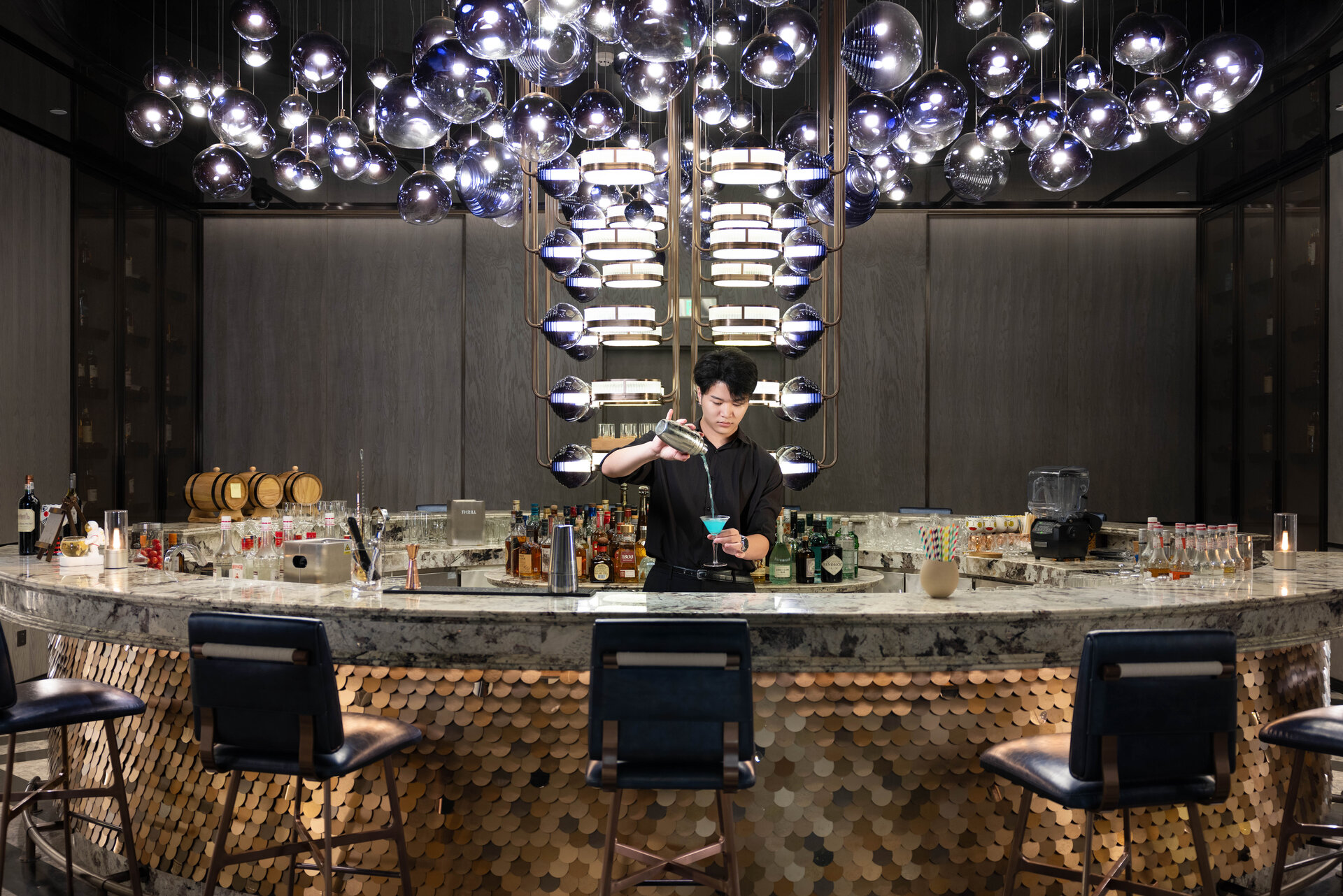 The interior of Dream of Dreams bar with ambient lighting and stylish seating.