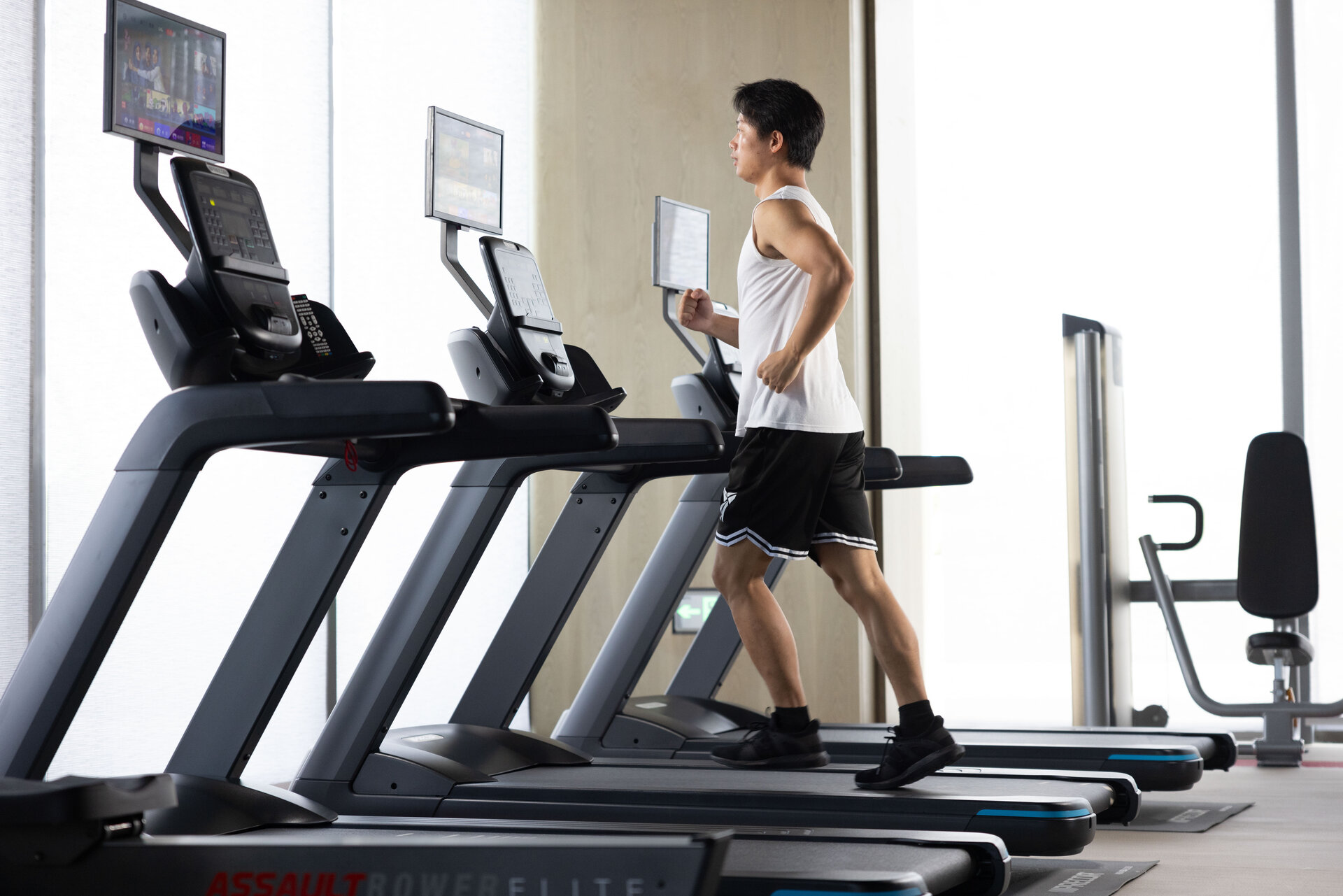The hotel's fitness center equipped with modern exercise machines.