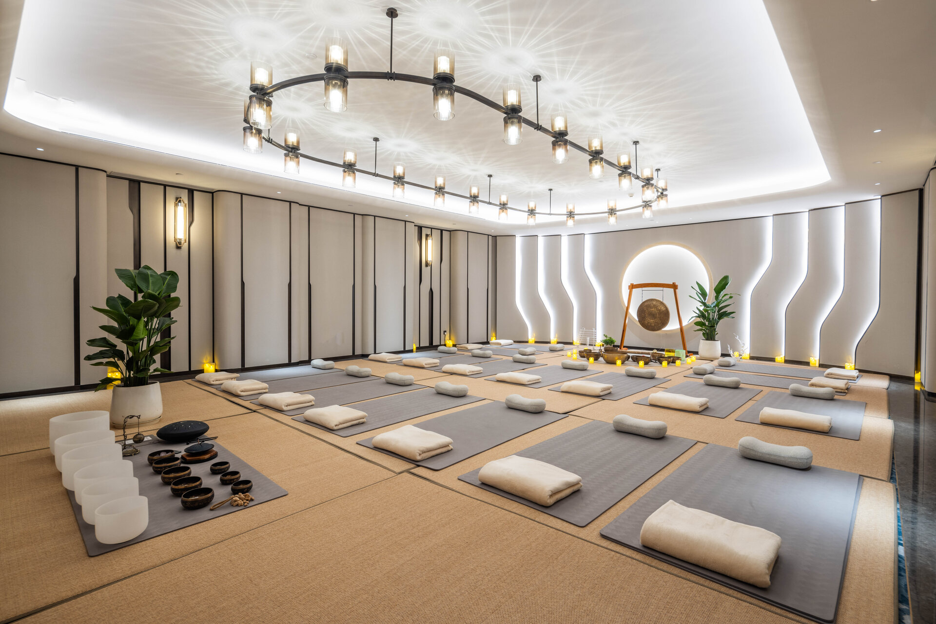 The interior of the singing bowl therapy room arranged for sound healing sessions.