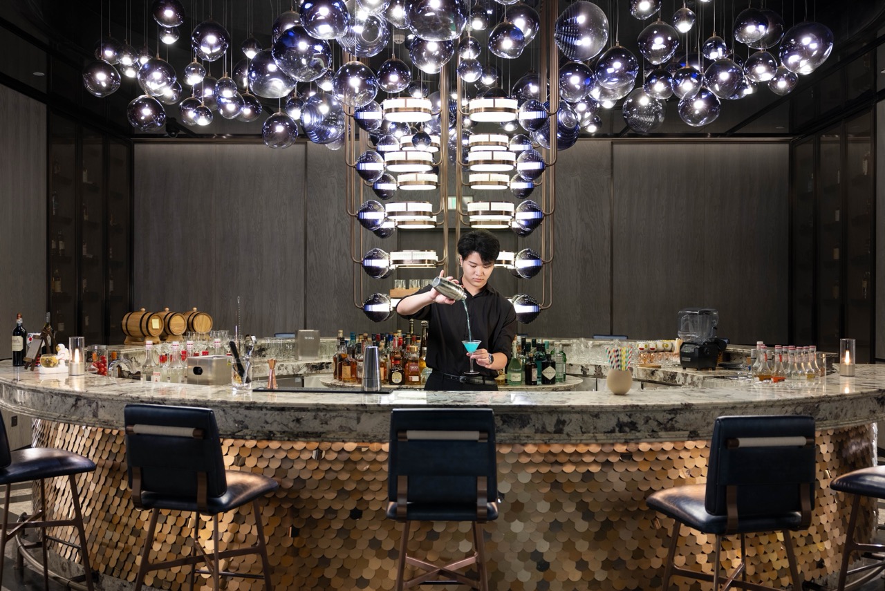 The interior of Dream of Dreams bar with ambient lighting and stylish seating.