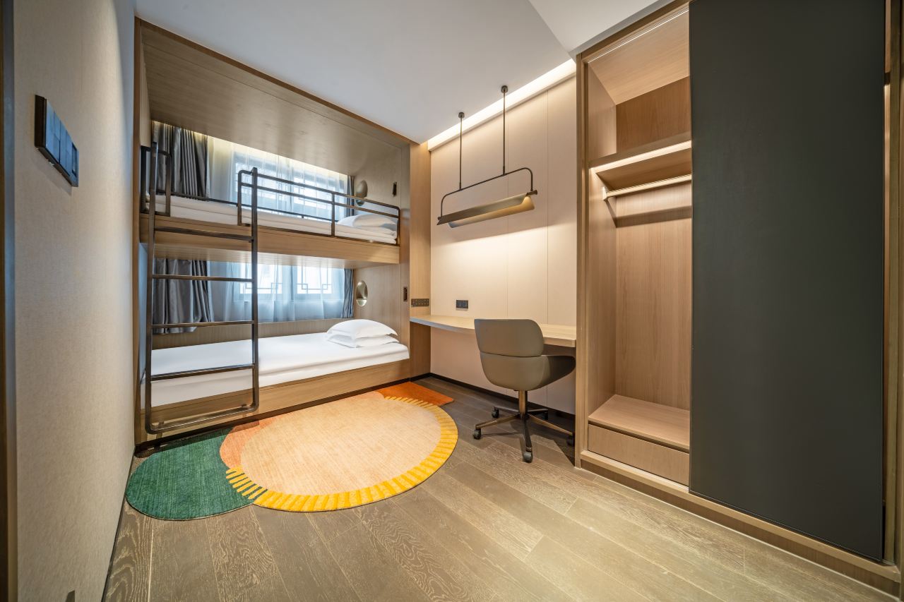Interior of a hip-hop themed family room with  bunk beds.