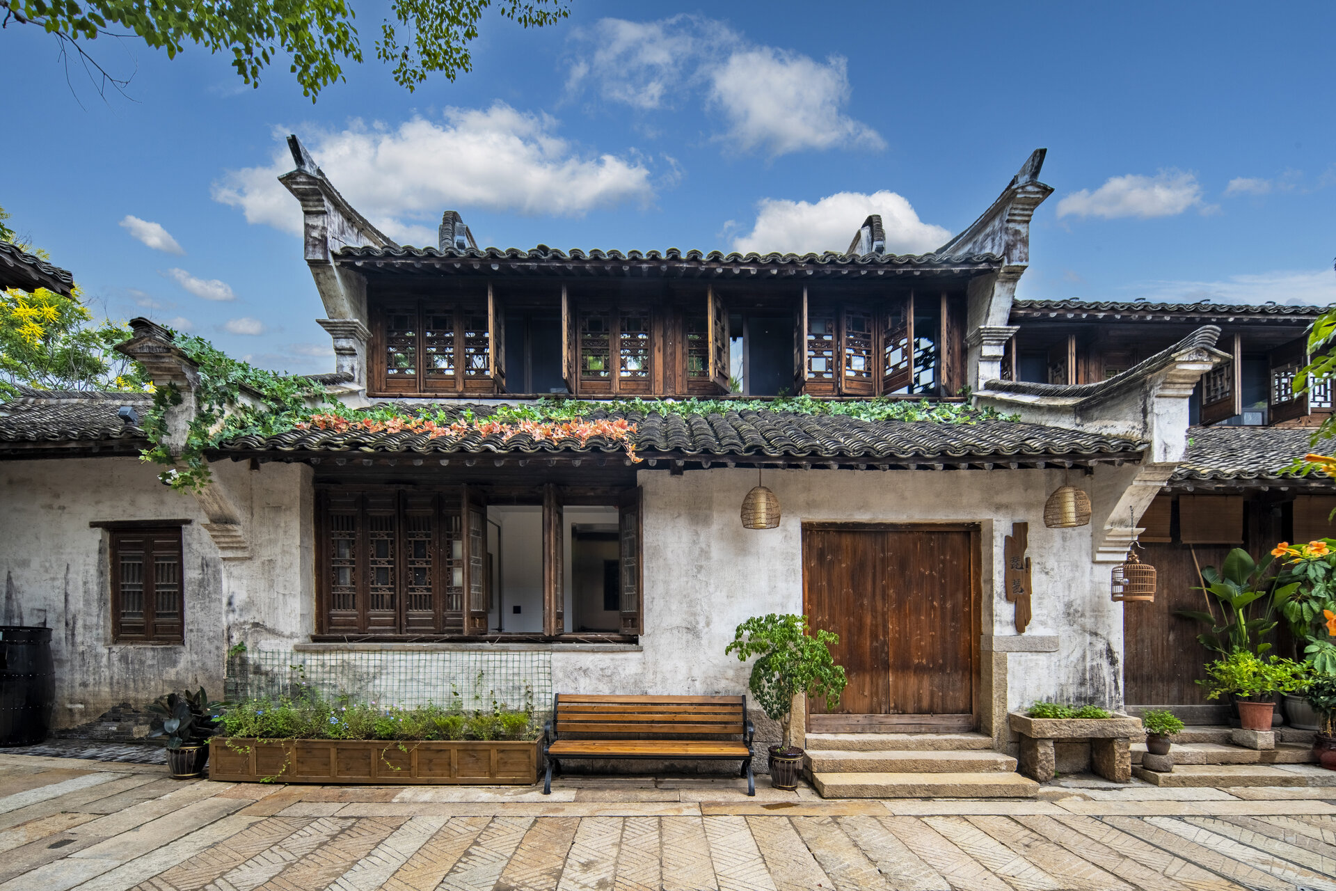 Exterior of Pipa Inn within Yanguan resort area featuring traditional architecture.