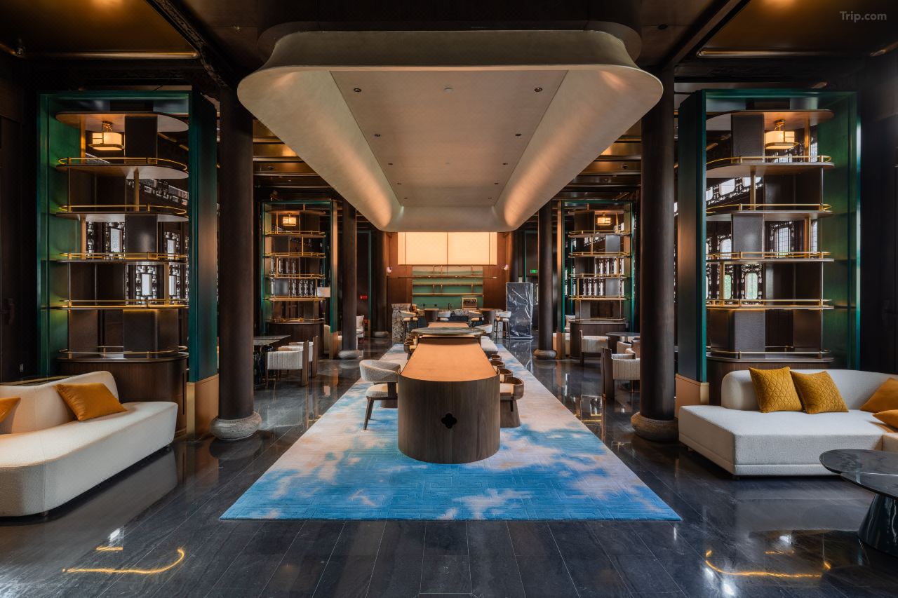 Stylish hotel lobby with lounge seating and warm ambiance.